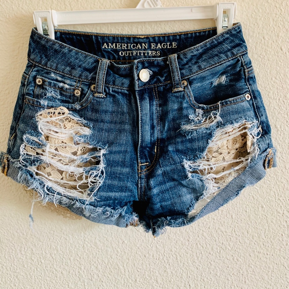 Distressed high rise American eagle shorts
